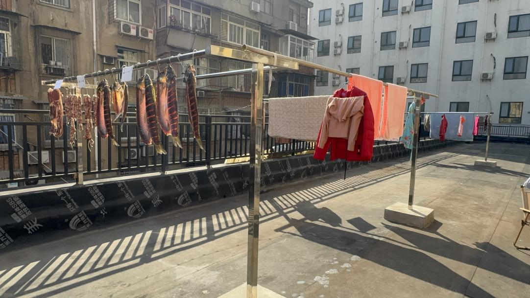 楼顶空间“大挪移”,晒出满满年味!硚口这个社区建起便民晾晒场1.png